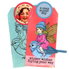 Card with rubber stamps art fairy design on a bird, rubber stamped with 'a cozy winter day' and 'winter wishes flying your way'
