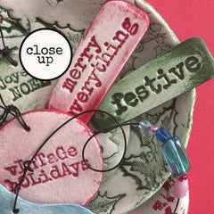 Decorative holiday tags with Das Air Dry Clay and Stamped with Red Lead Holiday Rubber Stamps