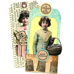 Two vintage-style tags featuring a young girl with  rubber stamped circle words and decorative elements.