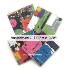Four small abstract 2-1/2" x 2-1/2" art prints or cards with colorful paint splatters and brushstrokes.