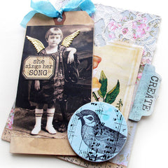 rubber stamped collage book page