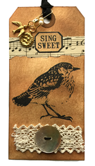 rubber stamped bird tag